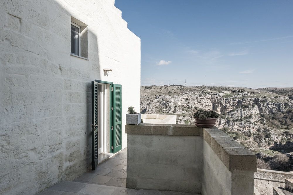 03-house-refurbishment-quartarella-lomo-architecture-balcony-sassi-matera-slider